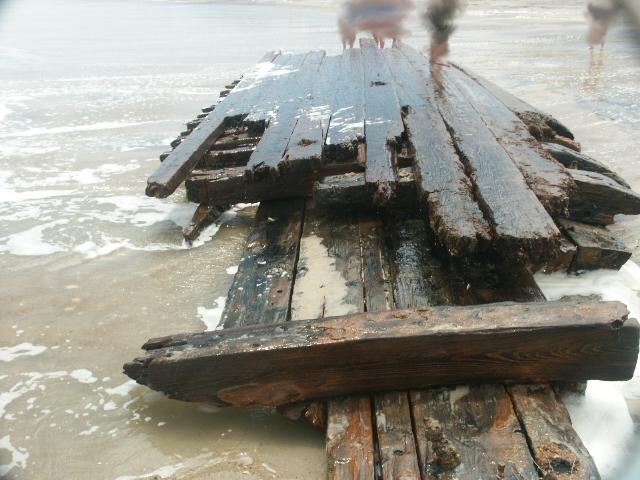 Is this the side or bottom of the ship? (Strangers Blurred Out)